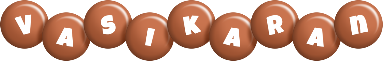 Vasikaran candy-brown logo